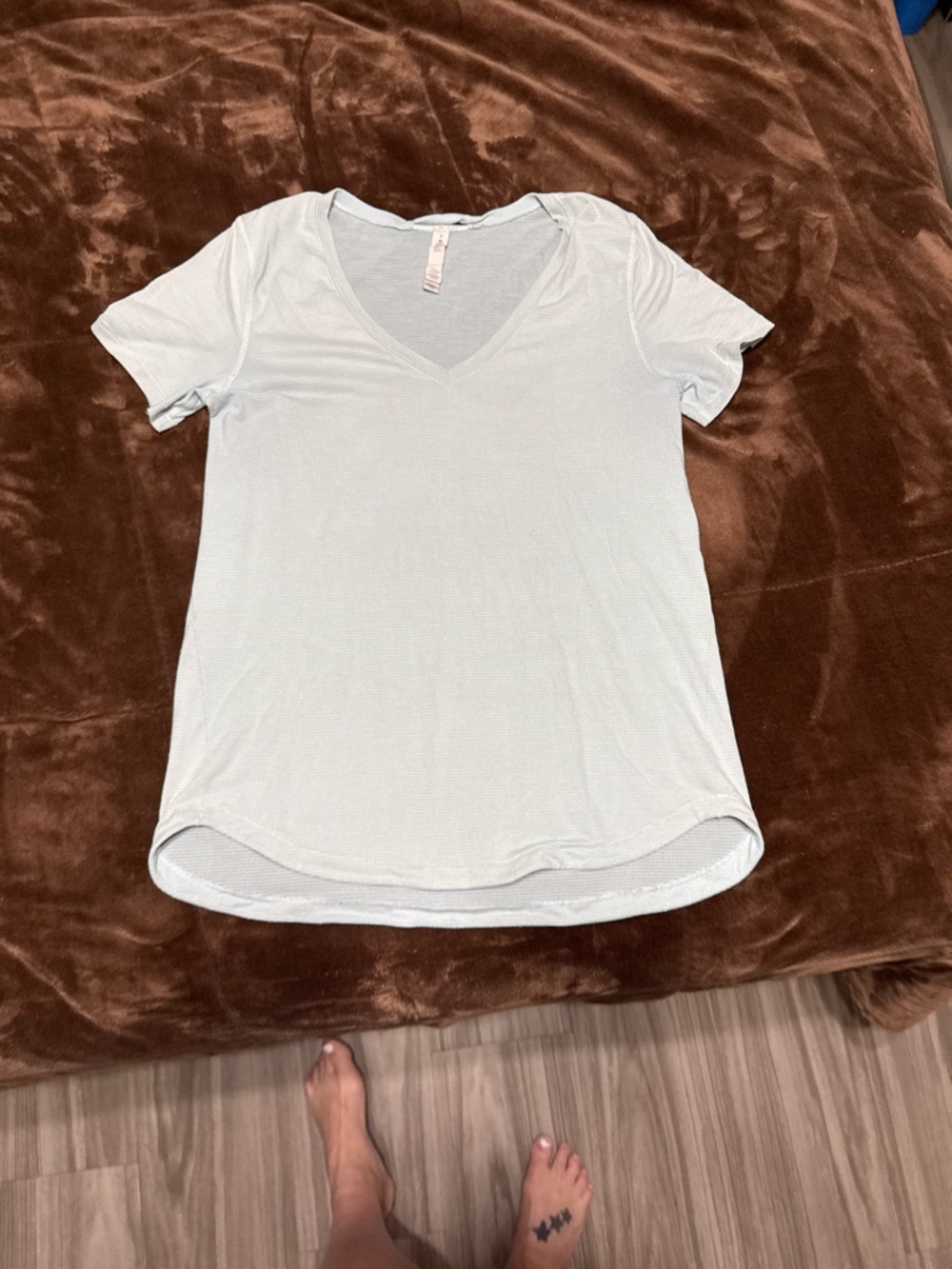 Woman’s size 8 lululemon Pale Blue V-Neck Short Sleeve Tee